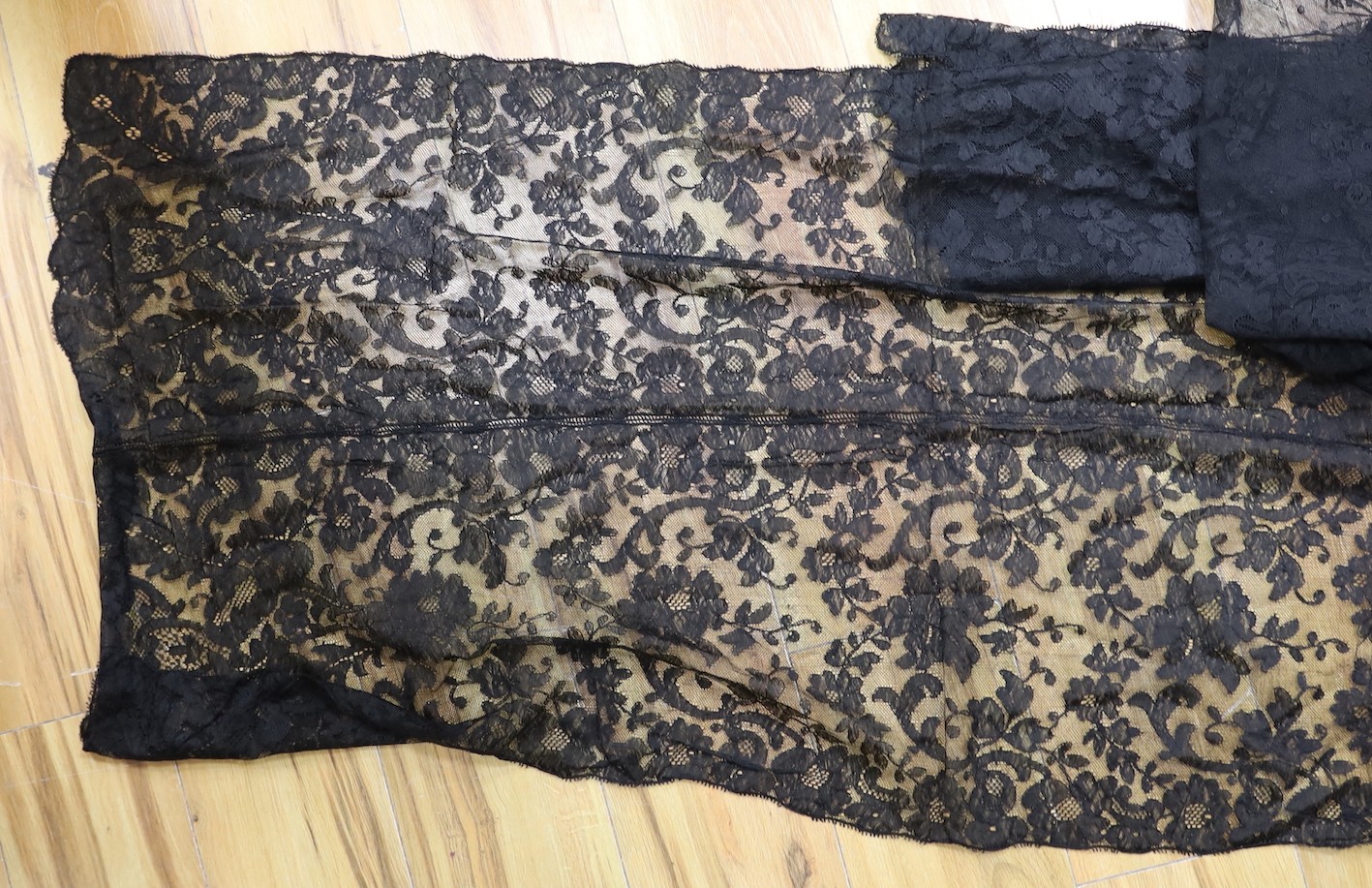 A black lace Matilla, a black lace flounce made into a skirt and a black lace jacket and stole